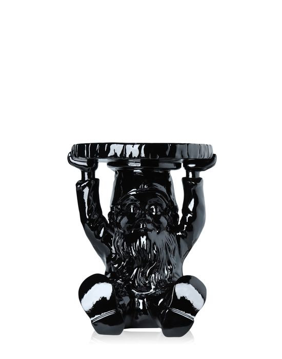 Schwarzer Kartell Gnomes Beistelltisch im Design eines Zwerges, der eine Tischplatte auf dem Kopf trägt.
