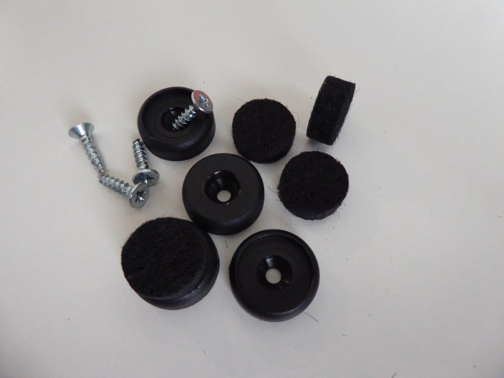 Filzgleiter Set für Eames Chair: Schwarze Filzgleiter, Schrauben und Kunststoffteile für Stuhlbeine.