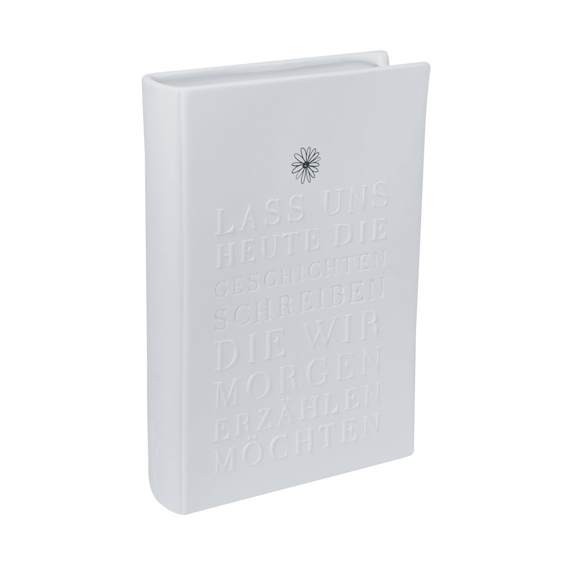 Weiße Vase in Buchform mit Aufschrift, Räder Geschichten schreiben Naturgeschichten Vase.