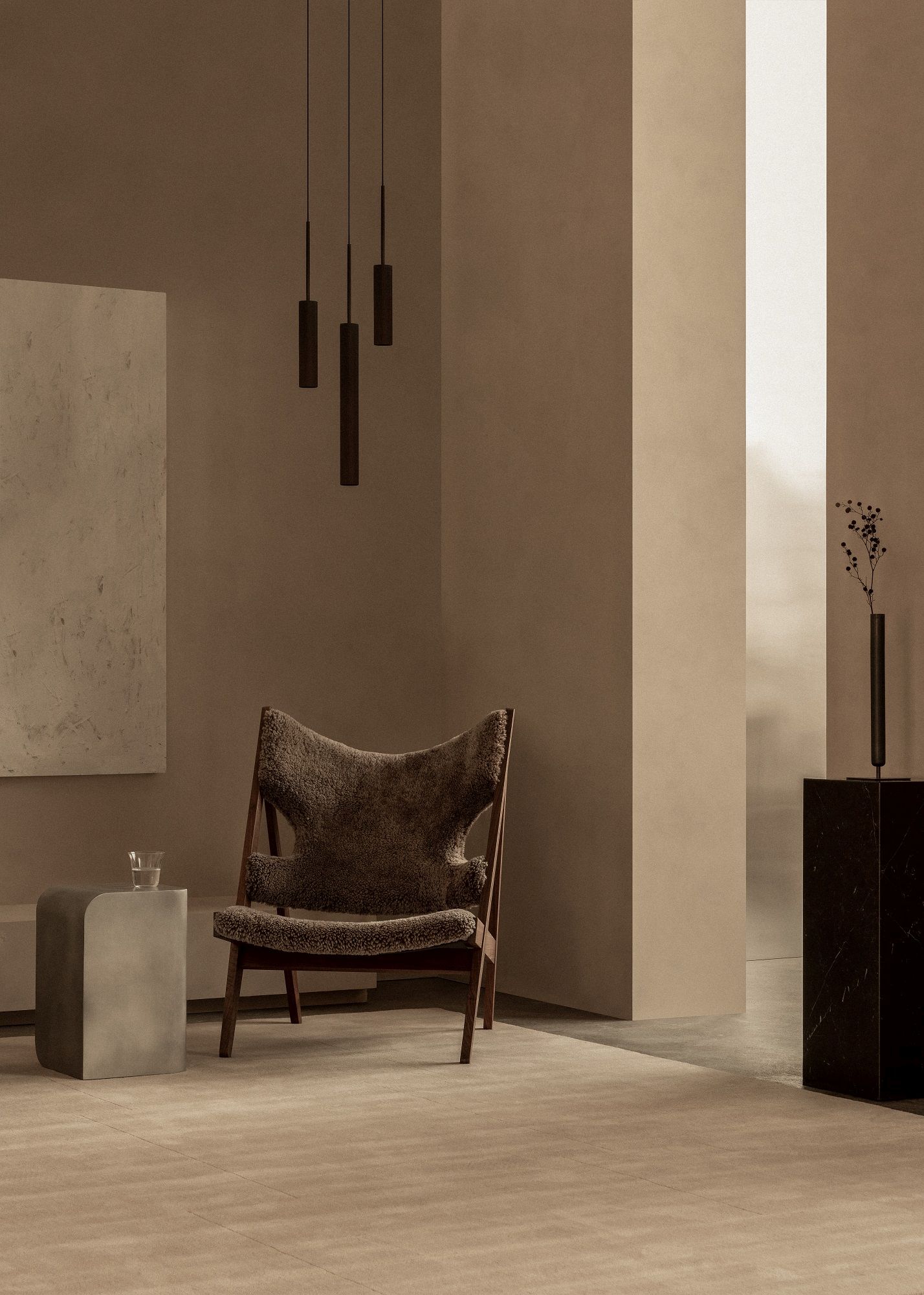 Audo Copenhagen Volume Side Table Beistelltisch aus Metall neben Sessel in minimalistischem Interieur.