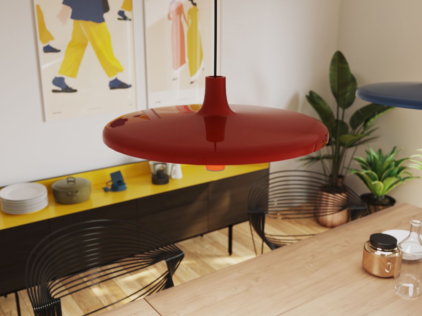 Nahaufnahme der roten Avro Hängeleuchte von Martinelli Luce über einem Esstisch in einem modernen Esszimmer.