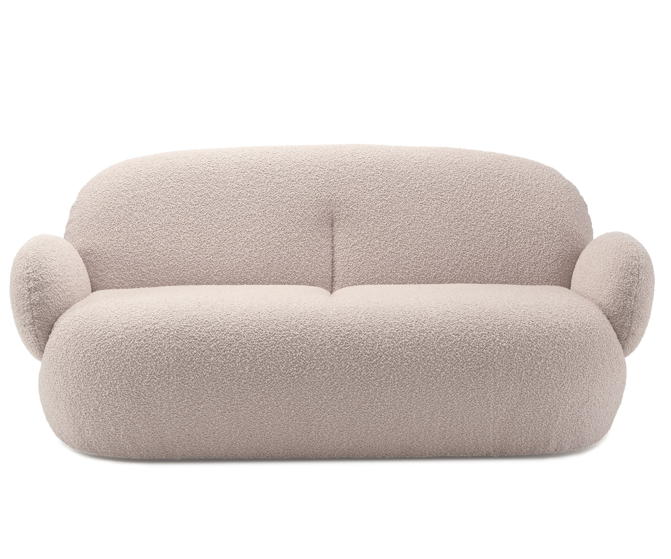 Nana Couch von Freifrau Manufaktur, modernes Sofa mit Bouclé-Bezug in Beige, bequemes Design für Wohnzimmer.