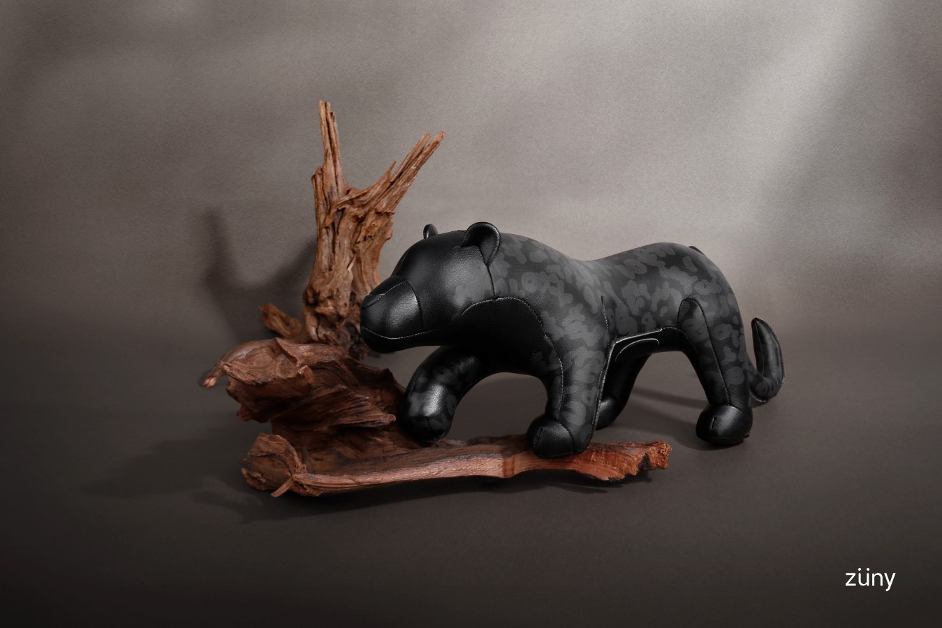 Schwarzer Leopard Buchstütze von Züny, dekoratives Wohnaccessoire für Bücherregale und Schreibtische, stilvolle Tierfigur.