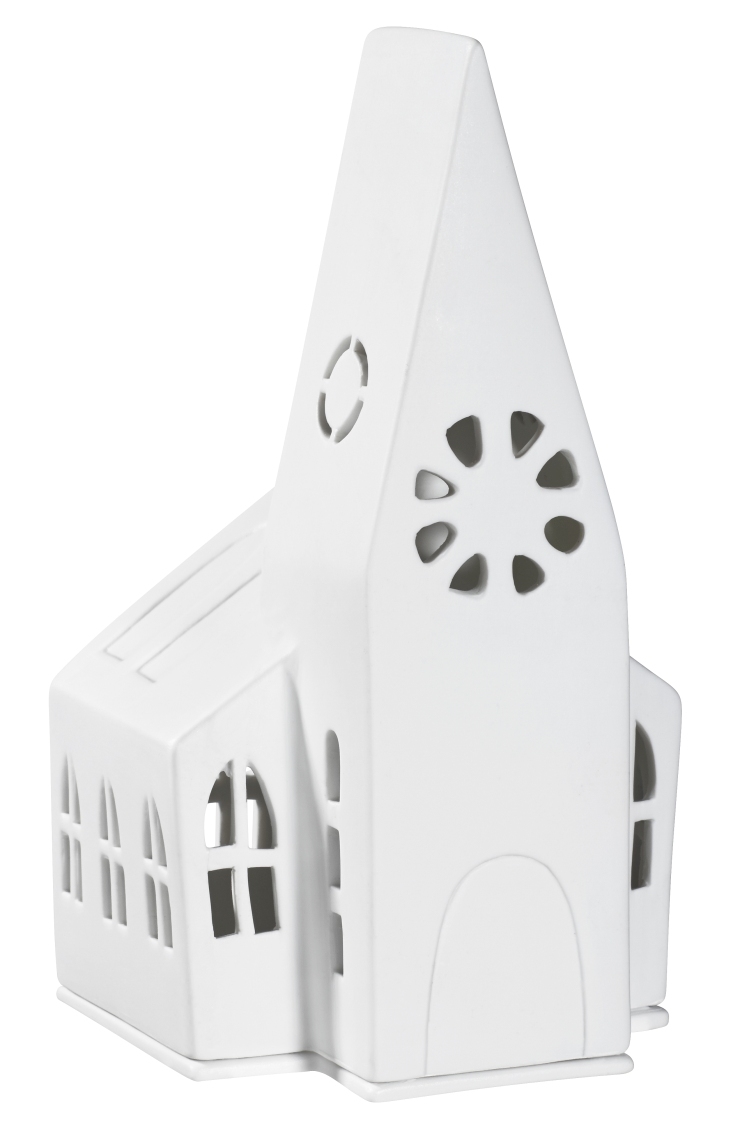 Detailaufnahme des weißen Zuhause Lichthaus Kirche Räder, einer dekorativen Keramik Kirche mit Fensteröffnungen für Teelichter.