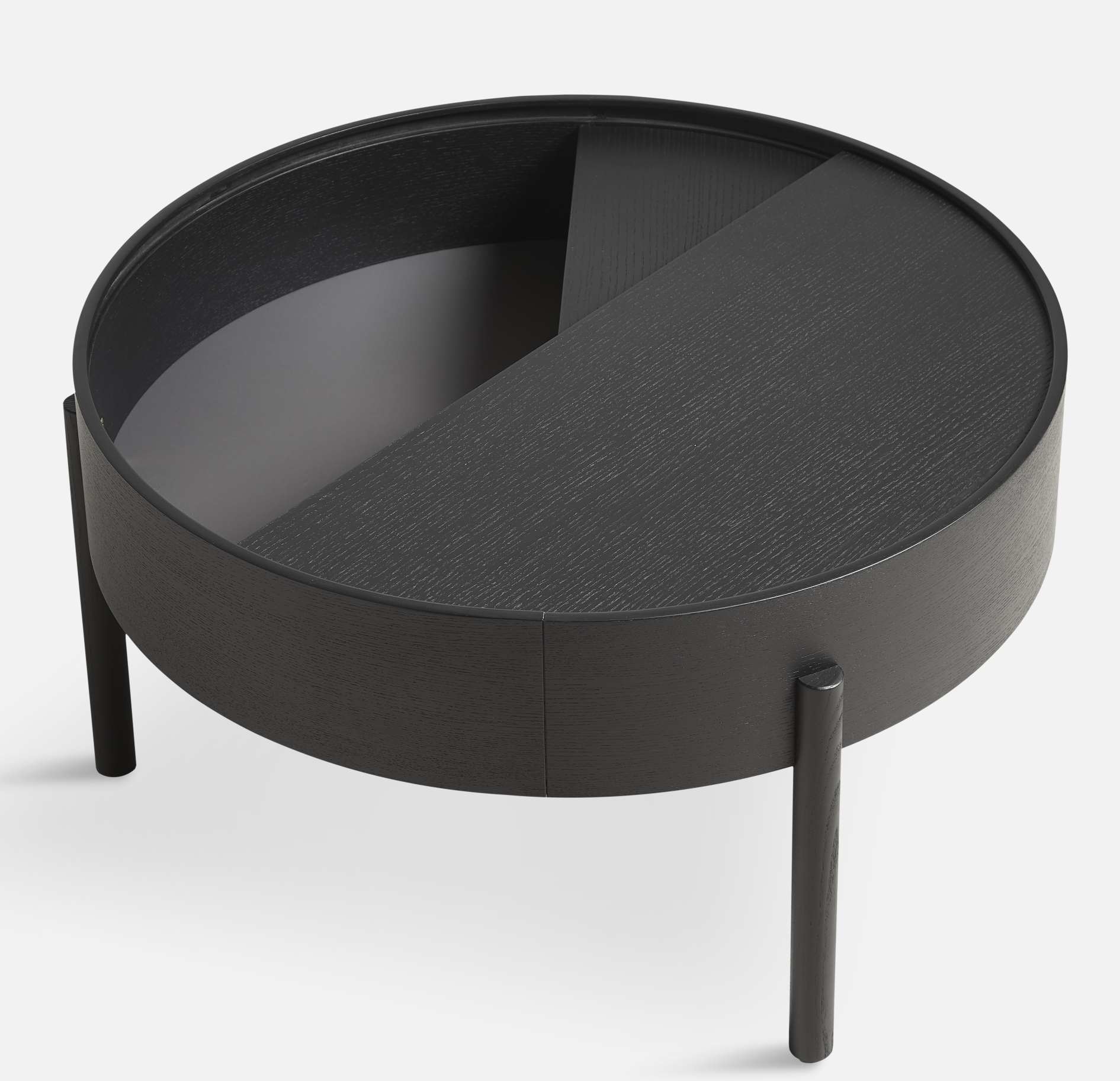 Schwarzer Arc Couchtisch von Woud, runder Holztisch mit Stauraum, modernes Möbeldesign für Wohnzimmer.