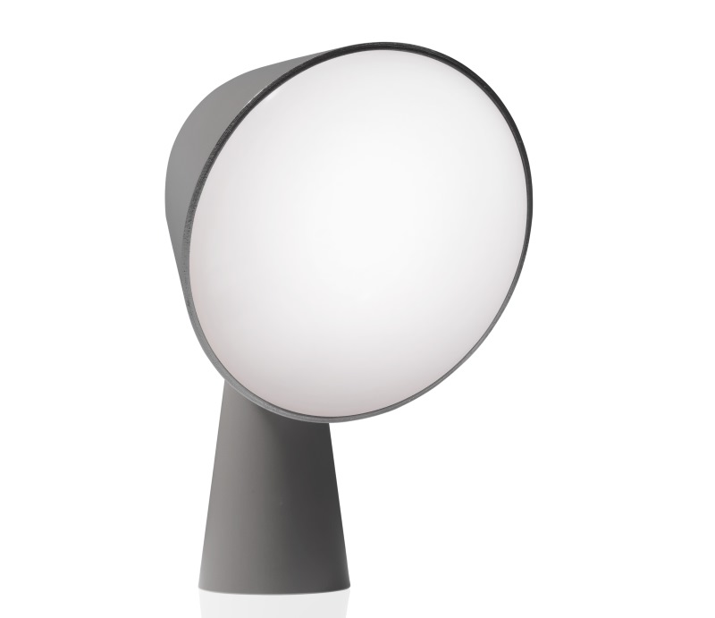 Graue Binic Tischleuchte von Foscarini mit rundem, leuchtendem Lampenschirm für Nachttisch oder Schreibtisch.
