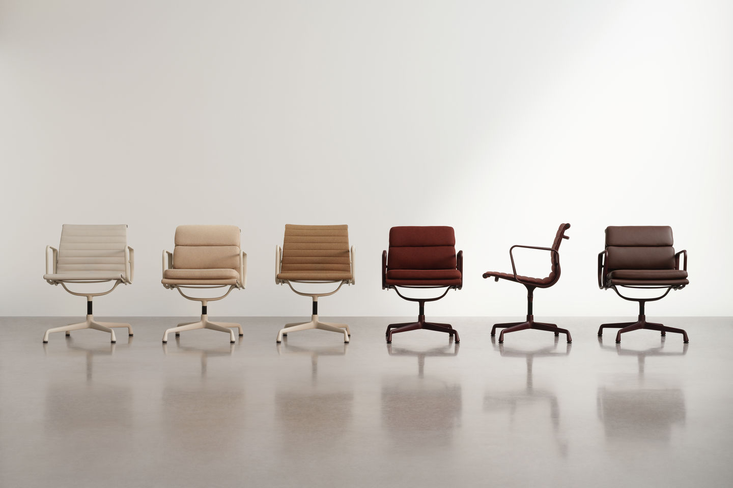 Reihe von sechs Vitra Soft Pad Chairs EA207 in verschiedenen Farben und Materialien.