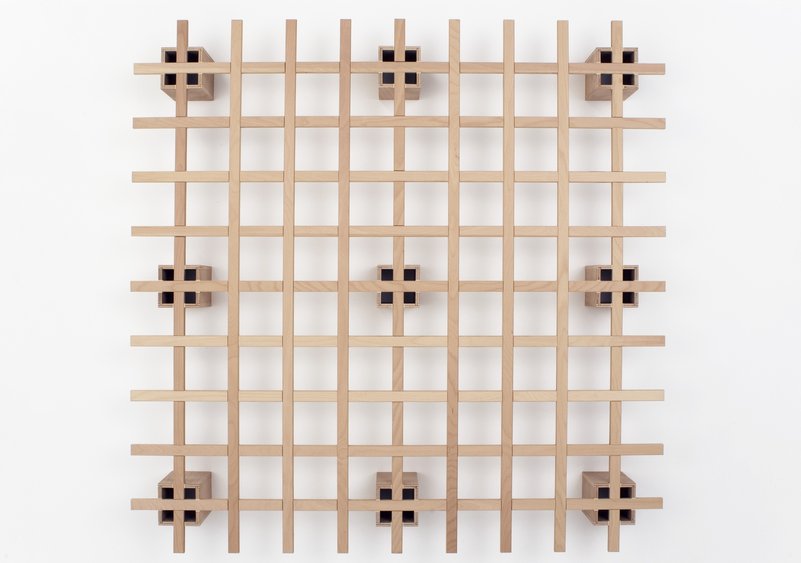 Tojo System Bett Cube  Lattenrost aus hellem Holz, minimalistisches Design für moderne Schlafzimmer.