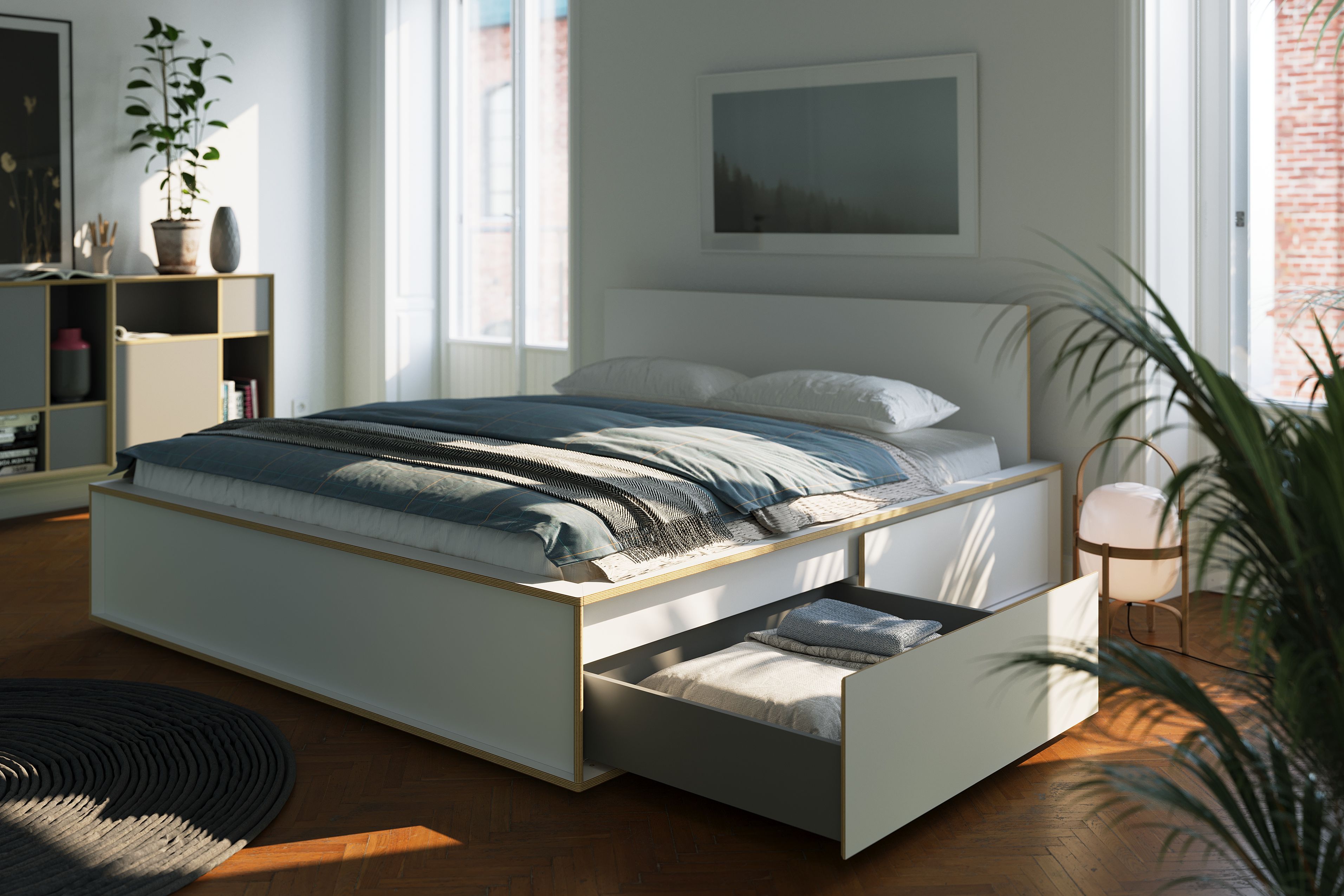 Spaze Bett von Müller Möbelwerkstätten mit Schublade in hellem Schlafzimmer. Modernes Designbett.