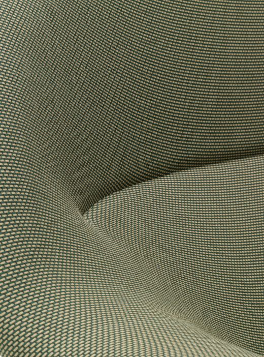 Detailaufnahme des grünen Stoffbezugs vom Abalon Sofa der Marke Vitra.