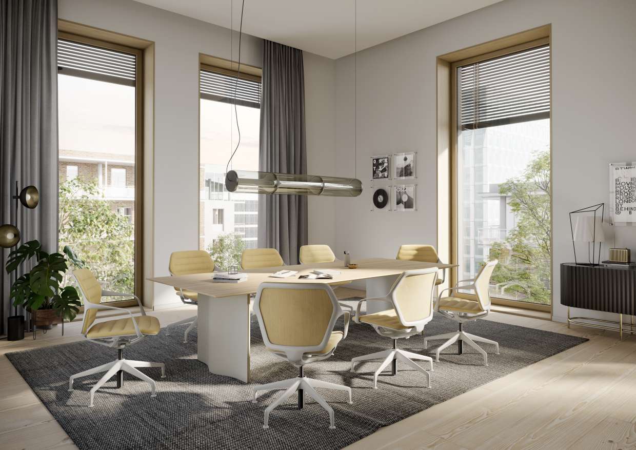 Büro mit großem Tisch und mehreren Ray Work Bürodrehstühlen von Brunner in Gelb.