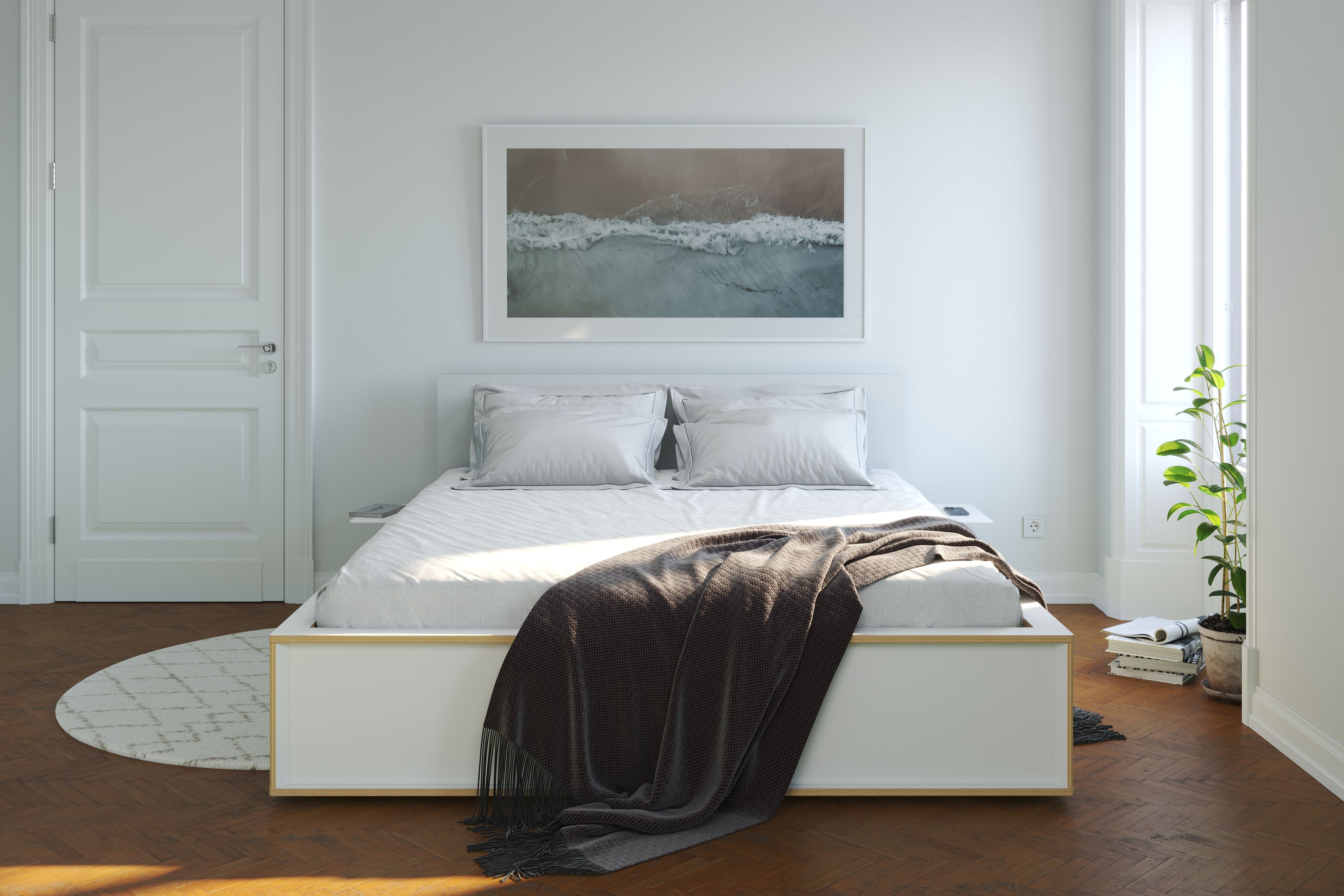 Helles Schlafzimmer mit Spaze Bett von Müller Möbelwerkstätten, weißer Bettwäsche und brauner Tagesdecke.