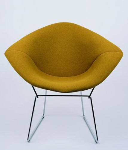 Gelber Diamond Sessel von Knoll International mit verchromtem Drahtgestell. Designklassiker für modernes Wohnen.