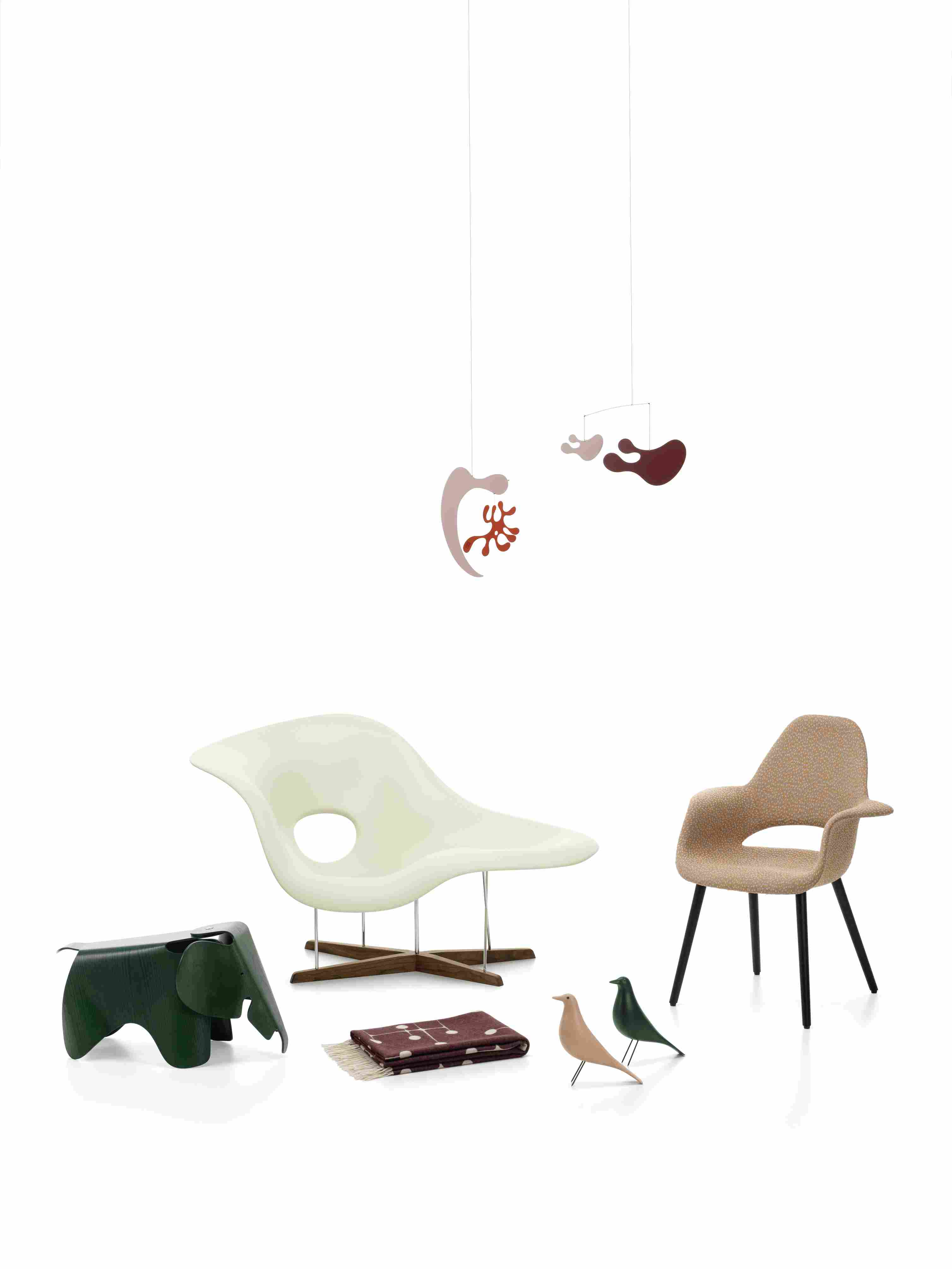 Dunkelgrüner Eames Elephant Hocker von Vitra, ein Designklassiker für Kinderzimmer und stilvolle Wohnräume.