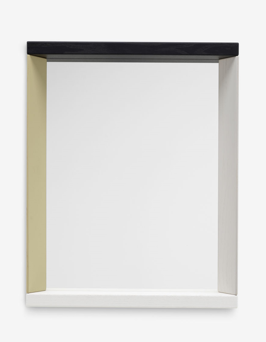 Vitra Colour Frame Spiegel mit farbigem Holzrahmen in Schwarz, Beige und Weiß.