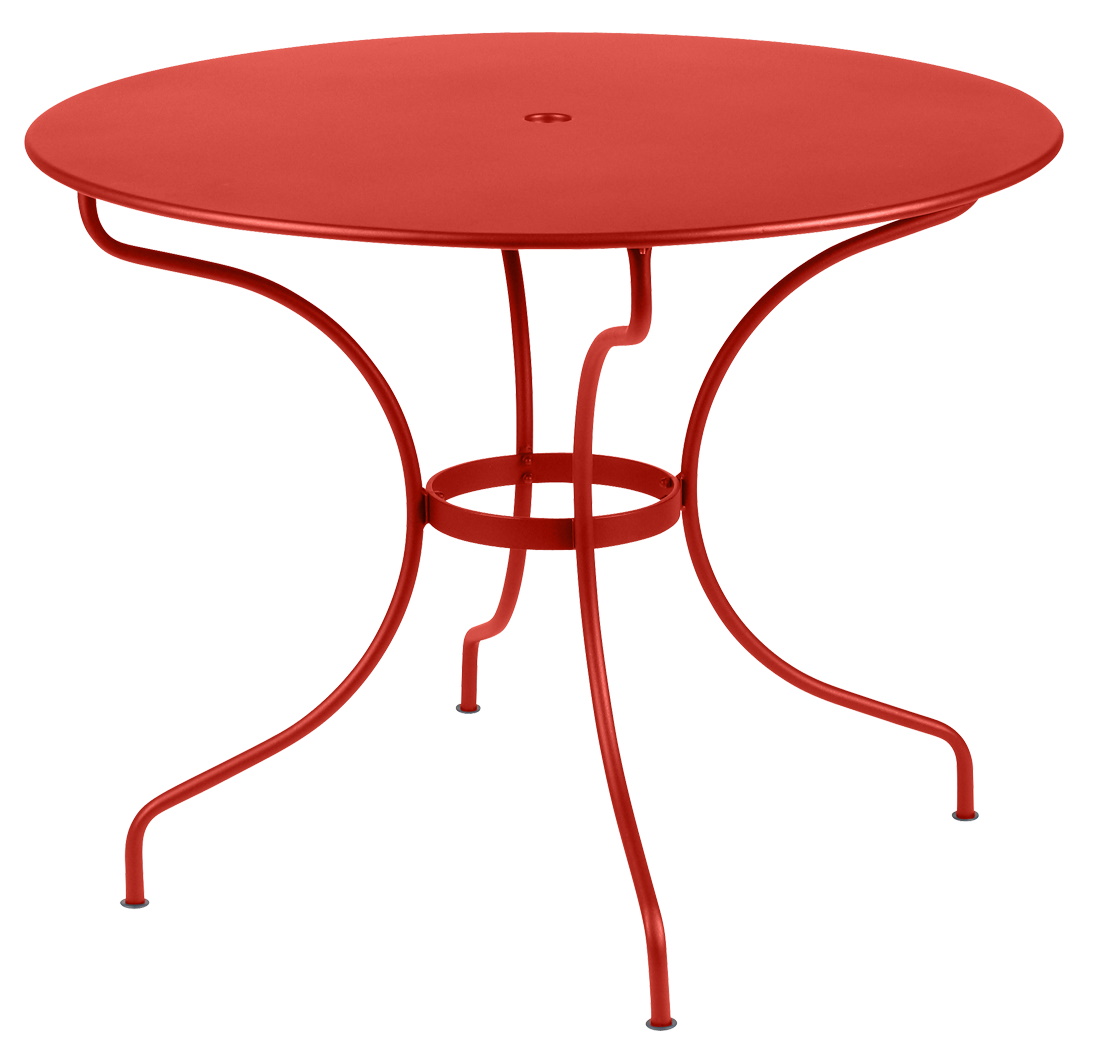 Roter Opéra+ Tisch von Fermob für den Außenbereich, runder Metalltisch mit filigranem Untergestell.
