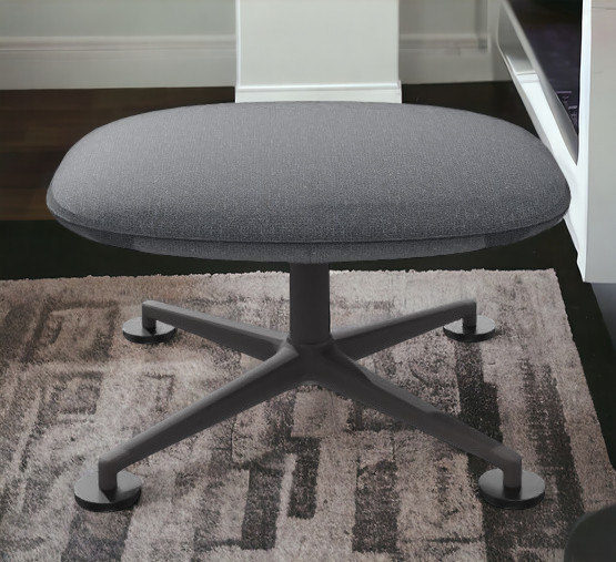 Grauer KN03 Ottoman von Knoll International mit Stoffbezug und Drehfuß auf einem Teppich.