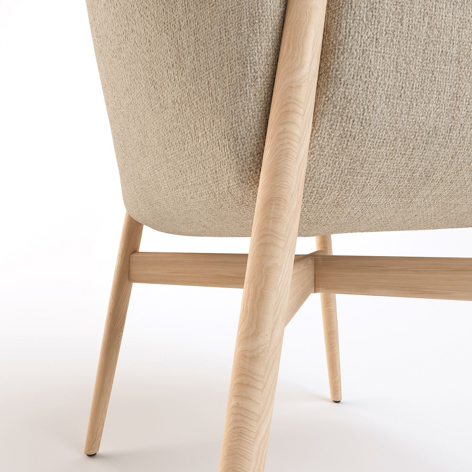 Detailaufnahme Kagu Stuhl mit hellem Holzgestell und beigem Stoffbezug, modernes Möbeldesign für Wohnzimmer.