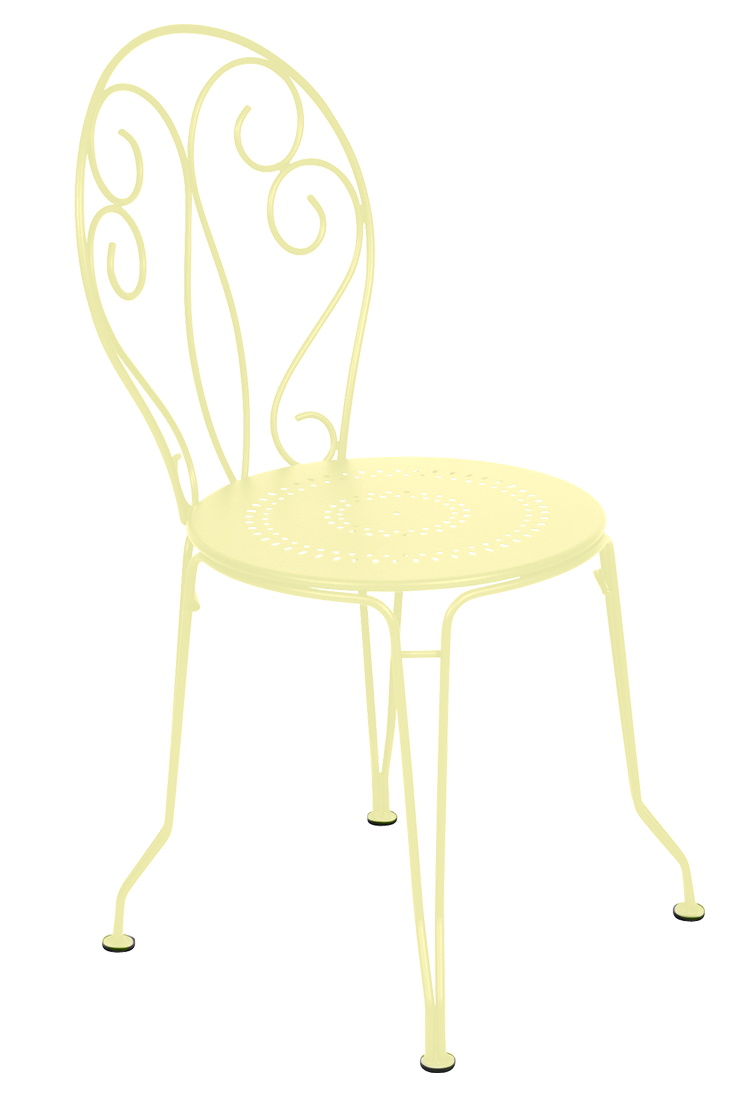 Fermob Montmartre Stuhl in Gelb für den Garten oder Balkon, filigranes Design mit Lochmuster.