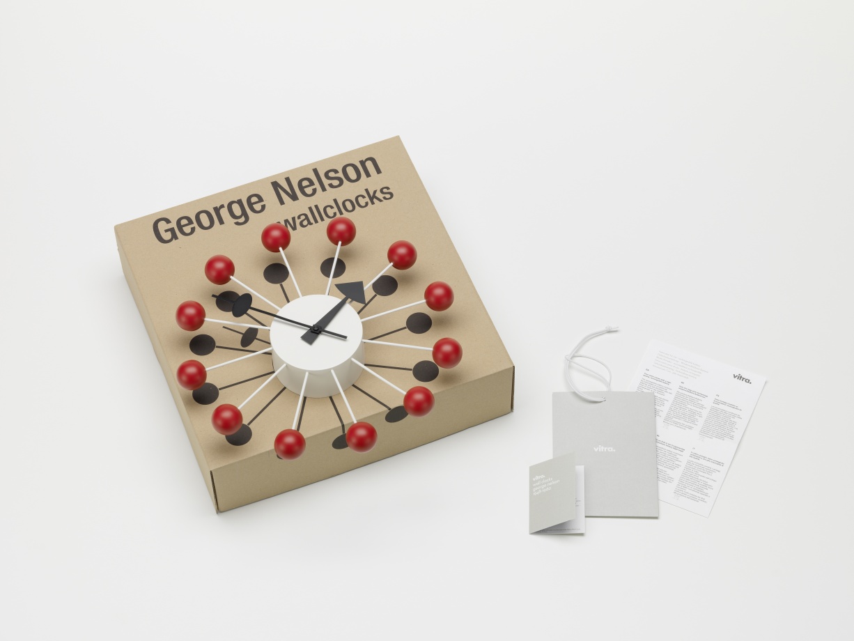 Vitra Ball Clock Wanduhr in Rot auf Karton, Designklassiker von George Nelson.