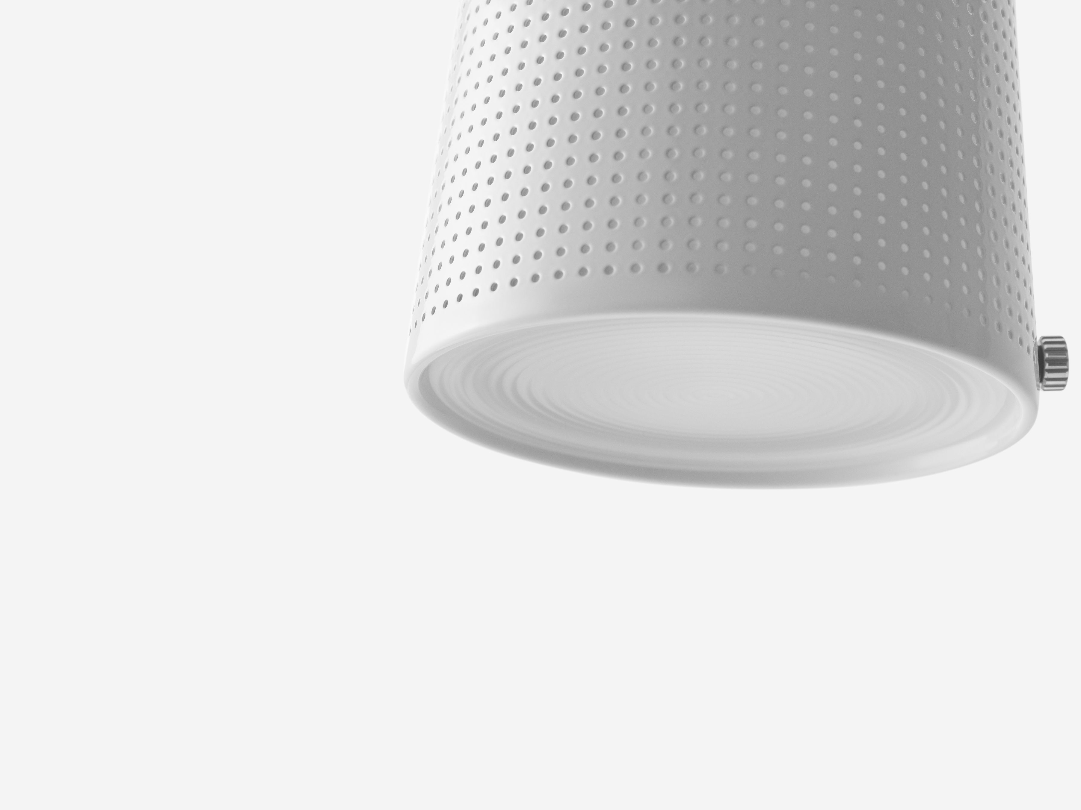 Detailaufnahme der weißen Vipp Wandleuchte mit feinen Perforationen für indirekte Beleuchtung und modernem Design.