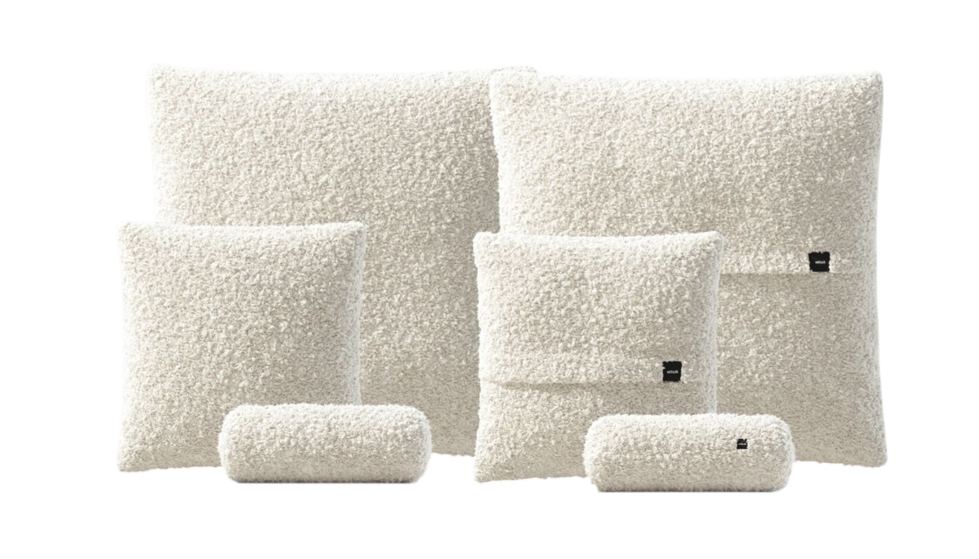 Vetsak Pillow Set: Flauschiges 6-teiliges Kissen-Set in Creme, bestehend aus drei Kissen und zwei Nackenrollen.
