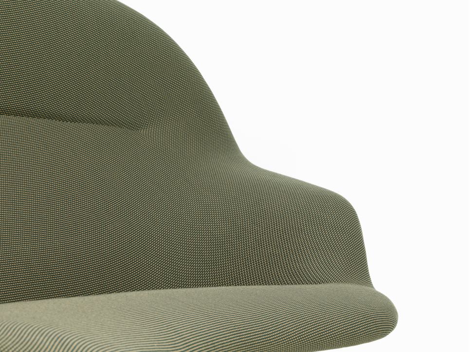Detailaufnahme des olivgrünen Vitra Abalon Sofas mit Textilbezug, modernes Design für Wohnzimmer.