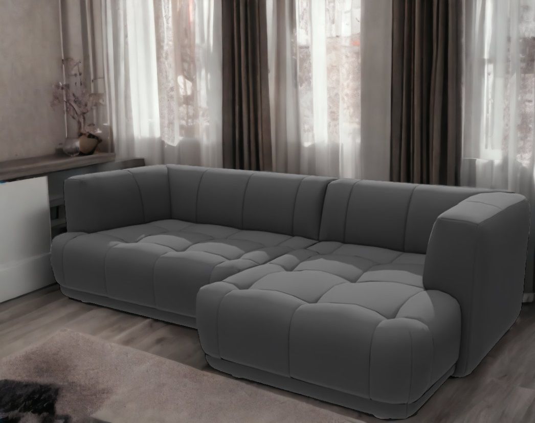 Graues Quilton Sofa von Hay, ein modernes Ecksofa mit gesteppten Polstern für Wohnzimmer und Lounge.