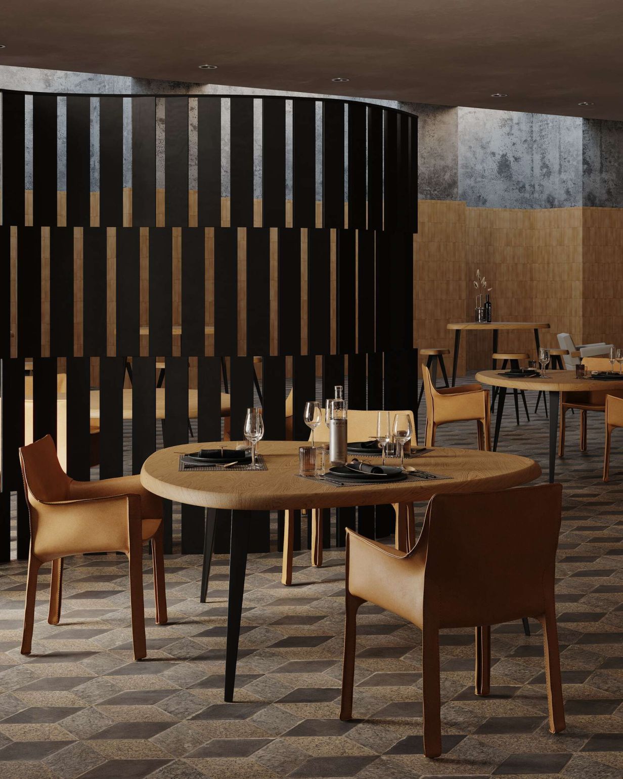 Runder Cassina Esstisch "Mexique 527" aus Holz mit schwarzem Gestell und Stühlen.