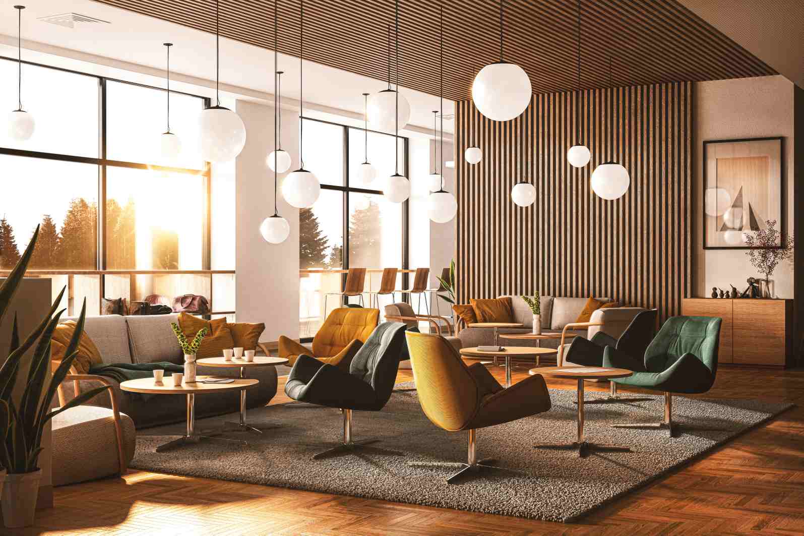 Innenaufnahme: Mehrere Thonet 809 Lounge-Sessel in Gelb, Grün und Schwarz mit passenden Tischen in einem Wartebereich.
