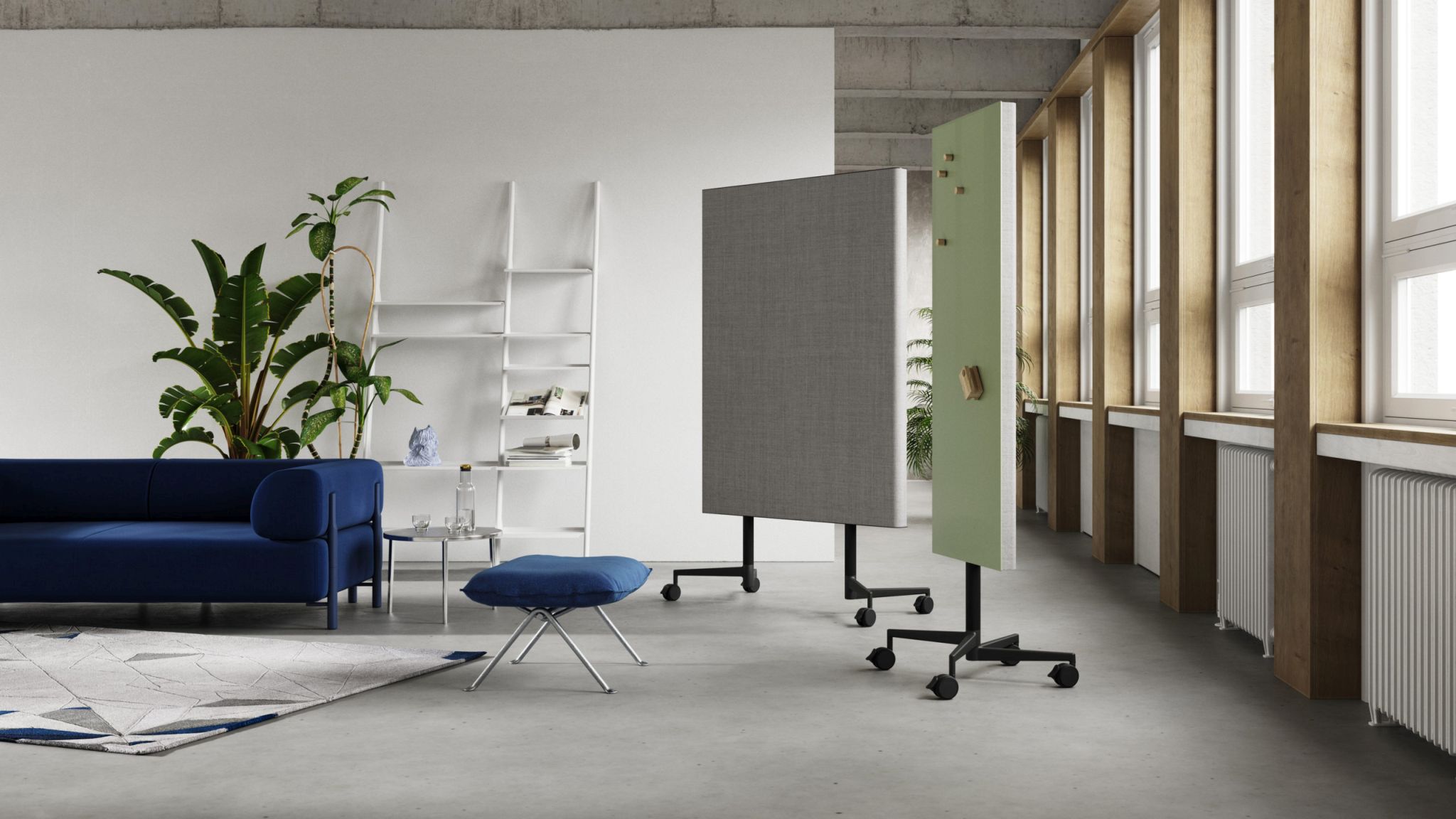 Zwei Chat Board Move Acoustic Stellwände in Grau und Grün im modernen Büro mit Rollen.