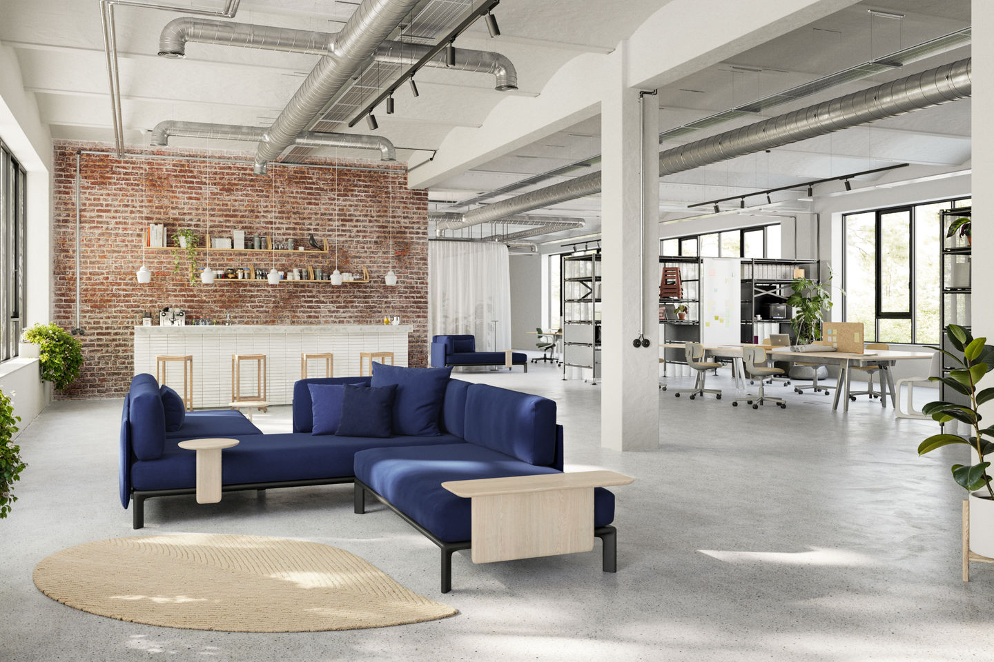 Blauer Anagram Plattformverbinder von Vitra in modernem Büro, flexible Sofalösung für modulare Bürolandschaften.