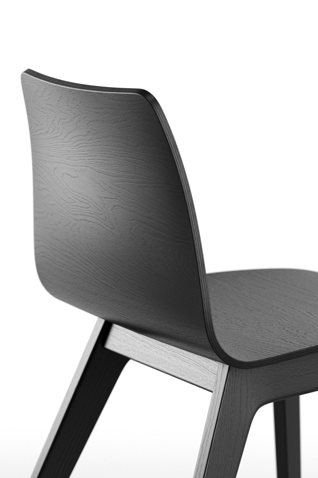 Detailaufnahme des Morph Plus Holzstuhls von Zeitraum, schwarzes Holz, ergonomische Form, modernes Design für Esszimmer und Büro.