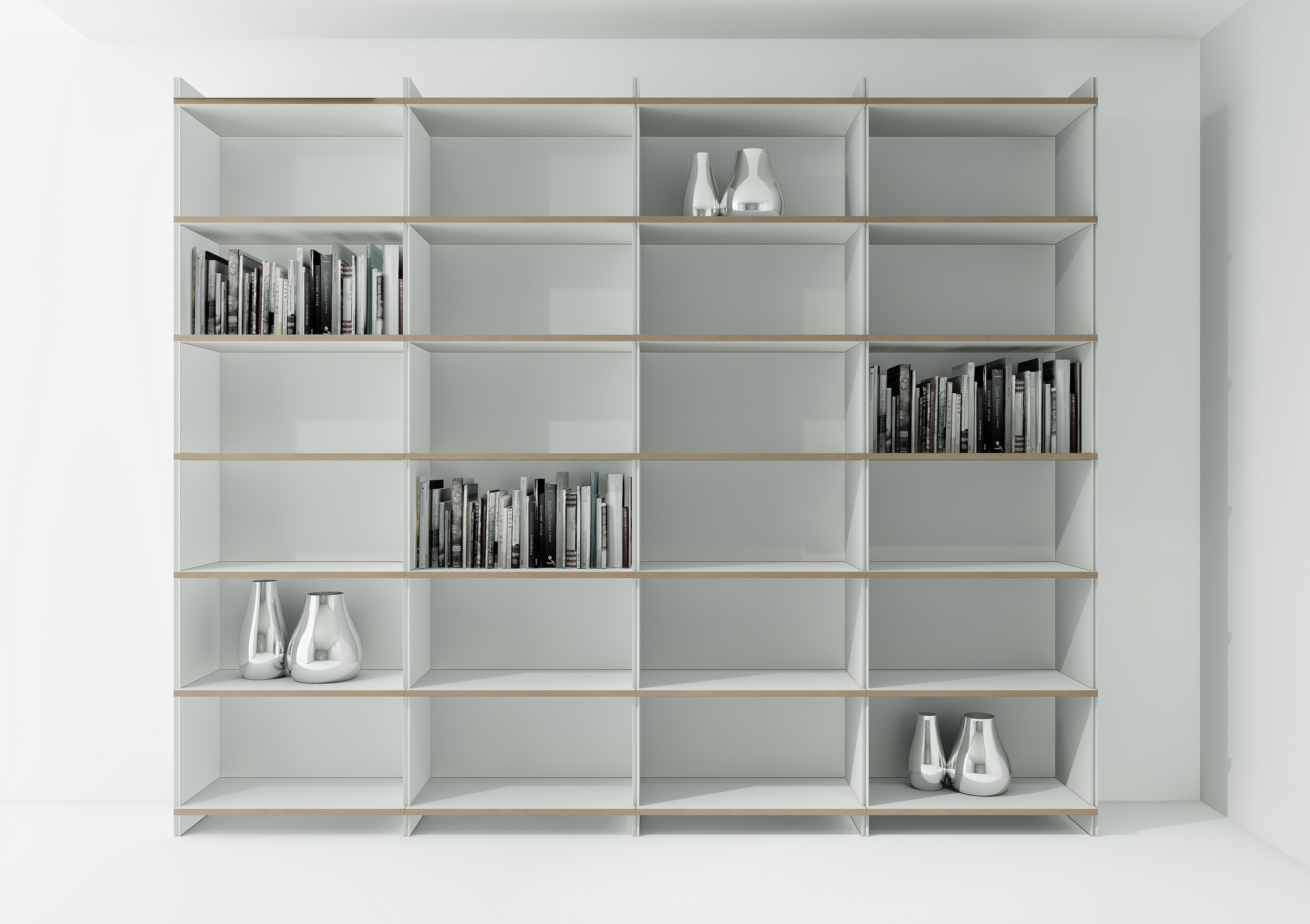Tojo Mehrfach Regal Grundmodul, weißes modulares Bücherregal mit vier Fächern, teilweise gefüllt mit Büchern und Dekoration.