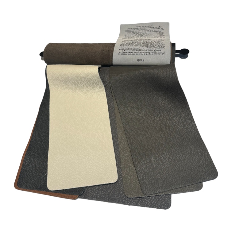 Ledermuster Cor: Farbpalette mit verschiedenen Lederproben in Beige, Grau und Braun für Möbel.