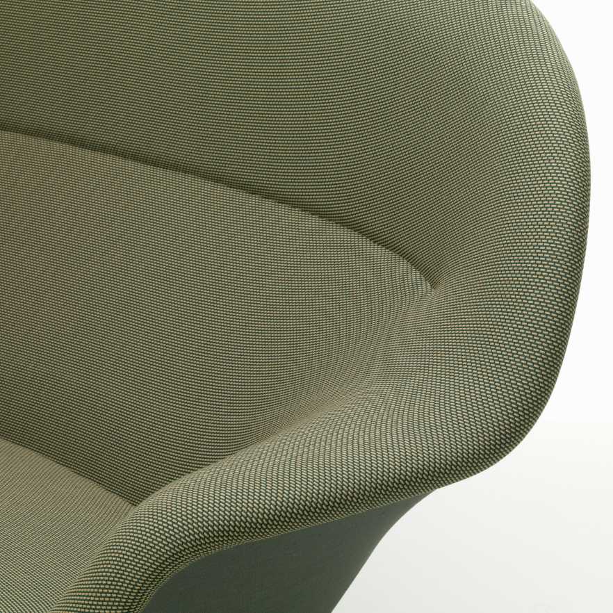 Detailaufnahme des Abalon Sofas von Vitra mit olivgrünem Stoffbezug und abgerundeten Formen.