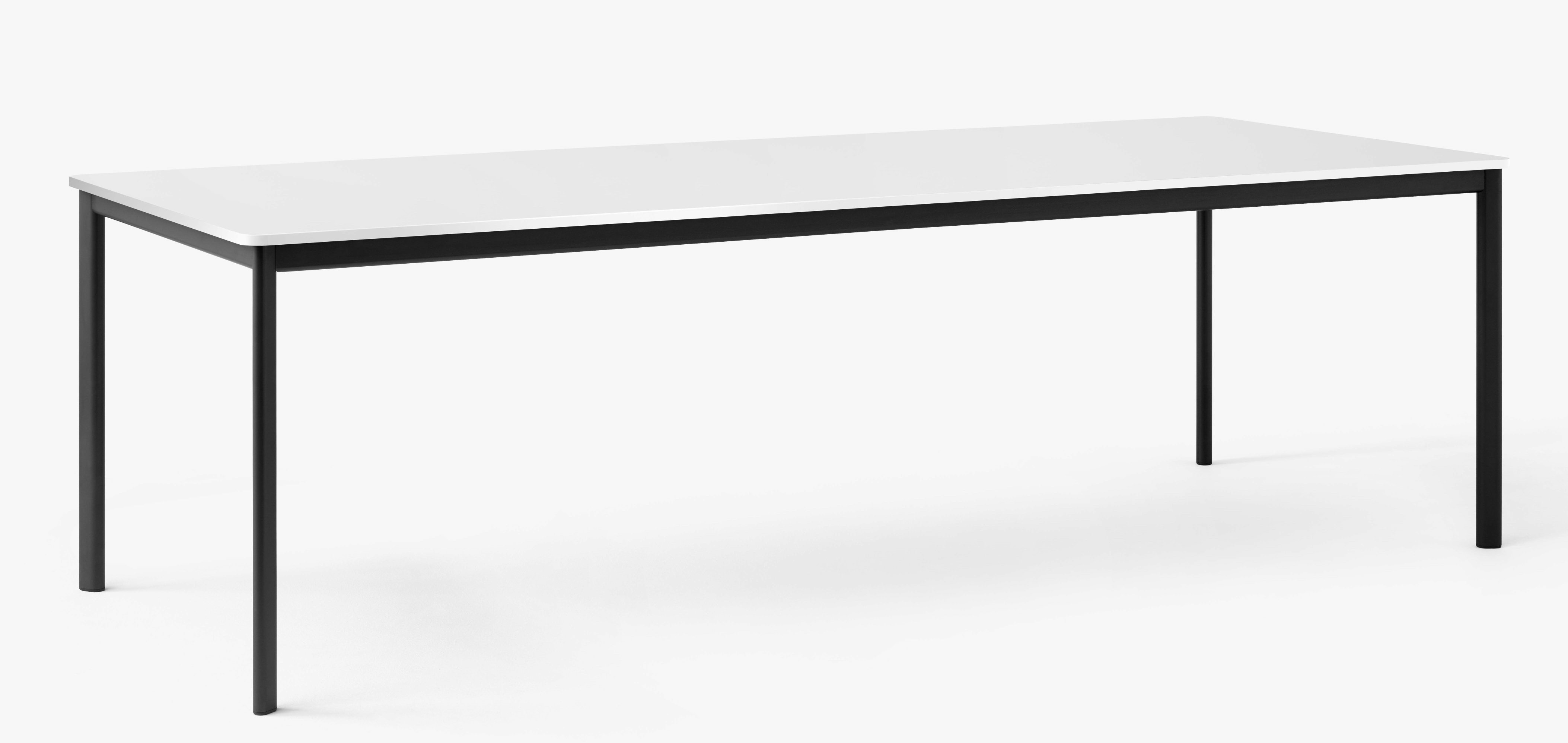 AndTradition Drip Table mit weißer Tischplatte und schwarzem Metallgestell für Esszimmer oder Büro.