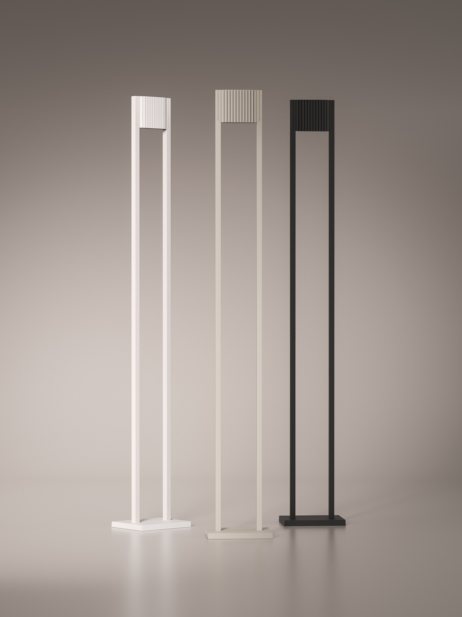 Drei Unic LED Stehleuchten in Weiß, Beige und Schwarz vor neutralem Hintergrund.