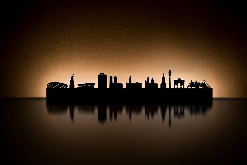 Licht City Kerzenständer: Silhouette einer Stadt, beleuchtet, als dekorativer Kerzenhalter für stimmungsvolles Licht.