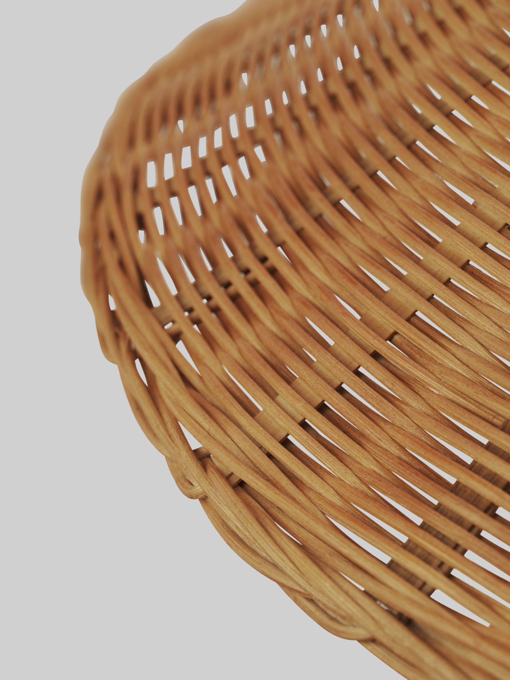 Detailaufnahme des geflochtenen Lampenschirms der 9602 Stehleuchte von Gubi. Naturmaterialien und skandinavisches Design.