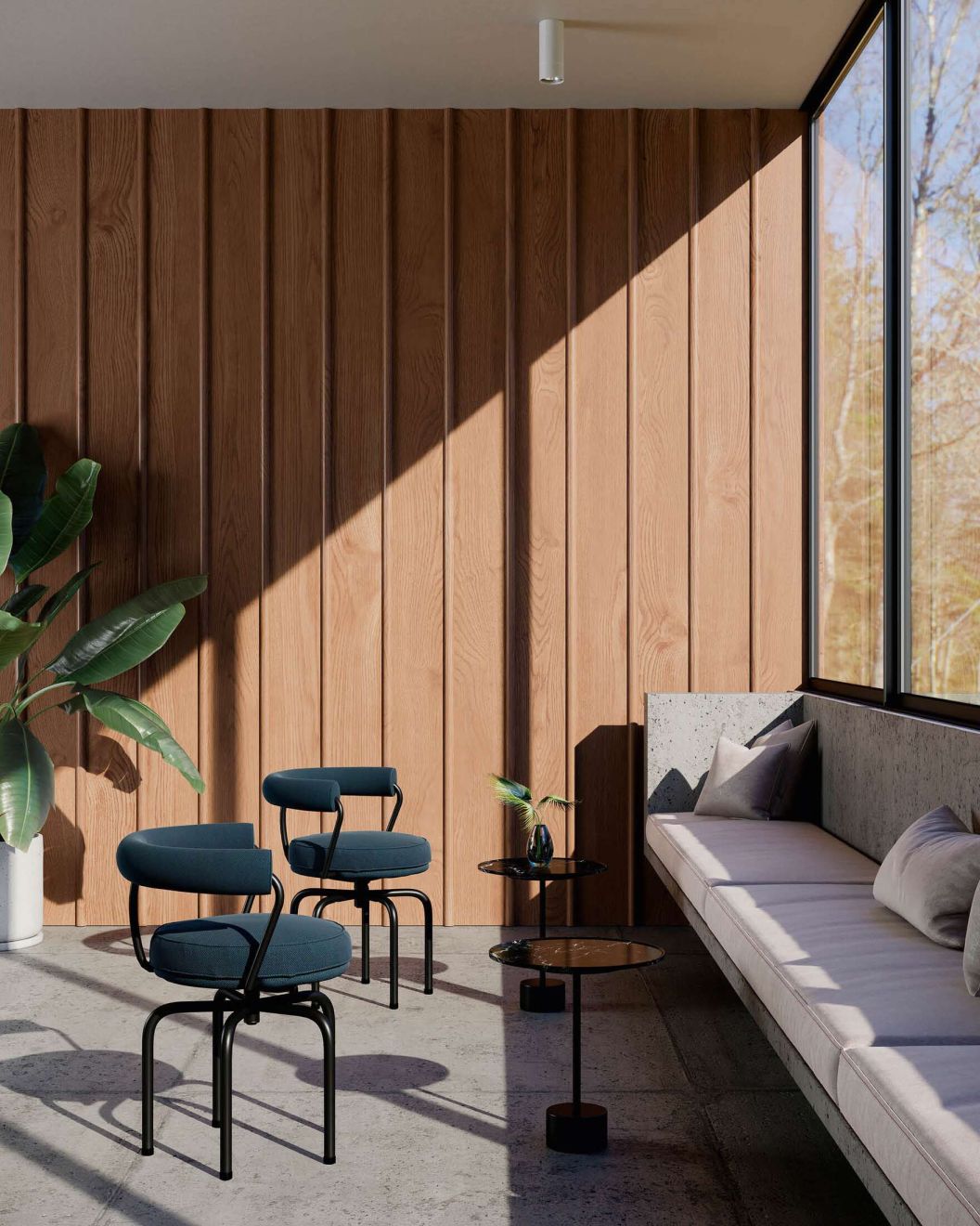 Zwei blaue Cassina Drehsessel "7 Fauteuil Tournant" mit schwarzem Gestell in modernem Raum.