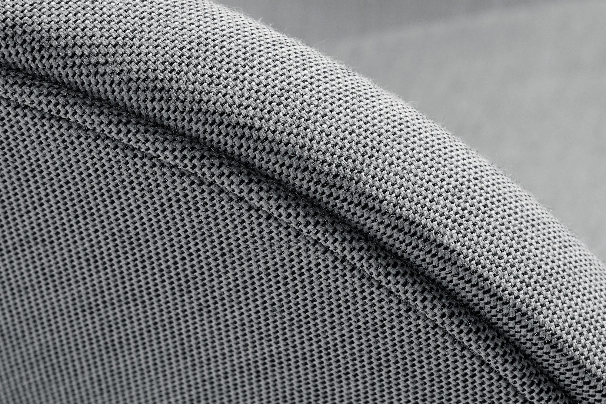 Detailaufnahme des grauen Stoffbezugs vom Hay About a Lounge Sessel AAL 92.