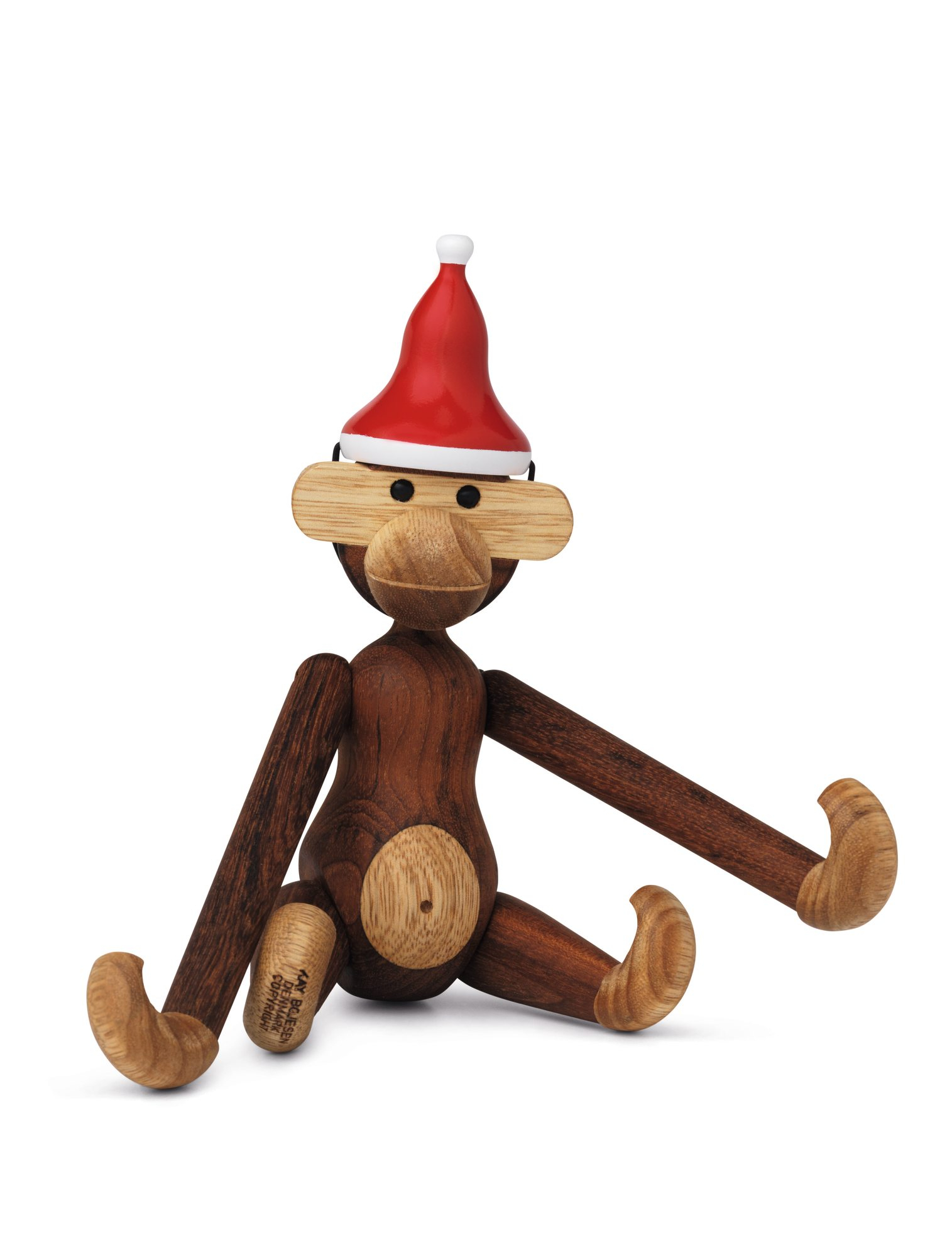 Affe Holzfigur Teak Kay Bojesen mit roter Weihnachtsmütze sitzend, detailreiche Holzverarbeitung, skandinavisches Design.