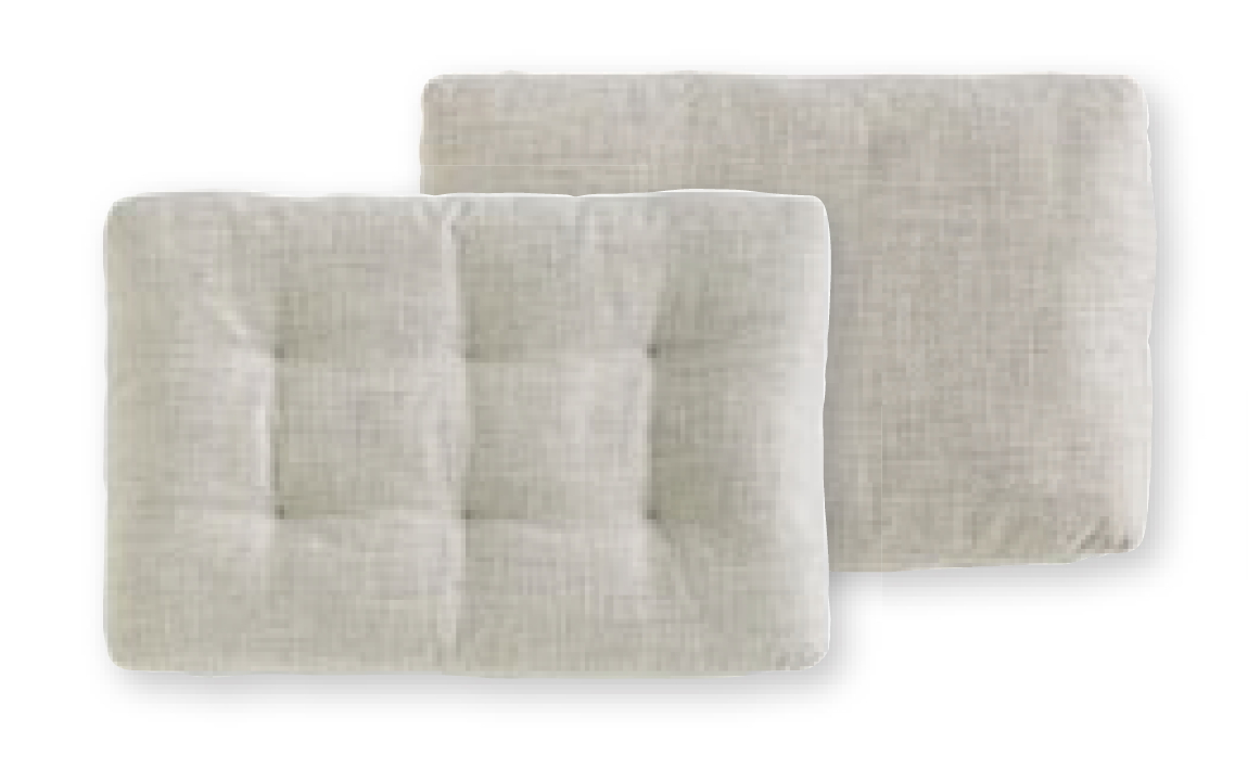 Zwei beigefarbene, quadratische Grand Sofa Rückenkissen von Vitra mit Knopfheftung für bequemes Sitzen.