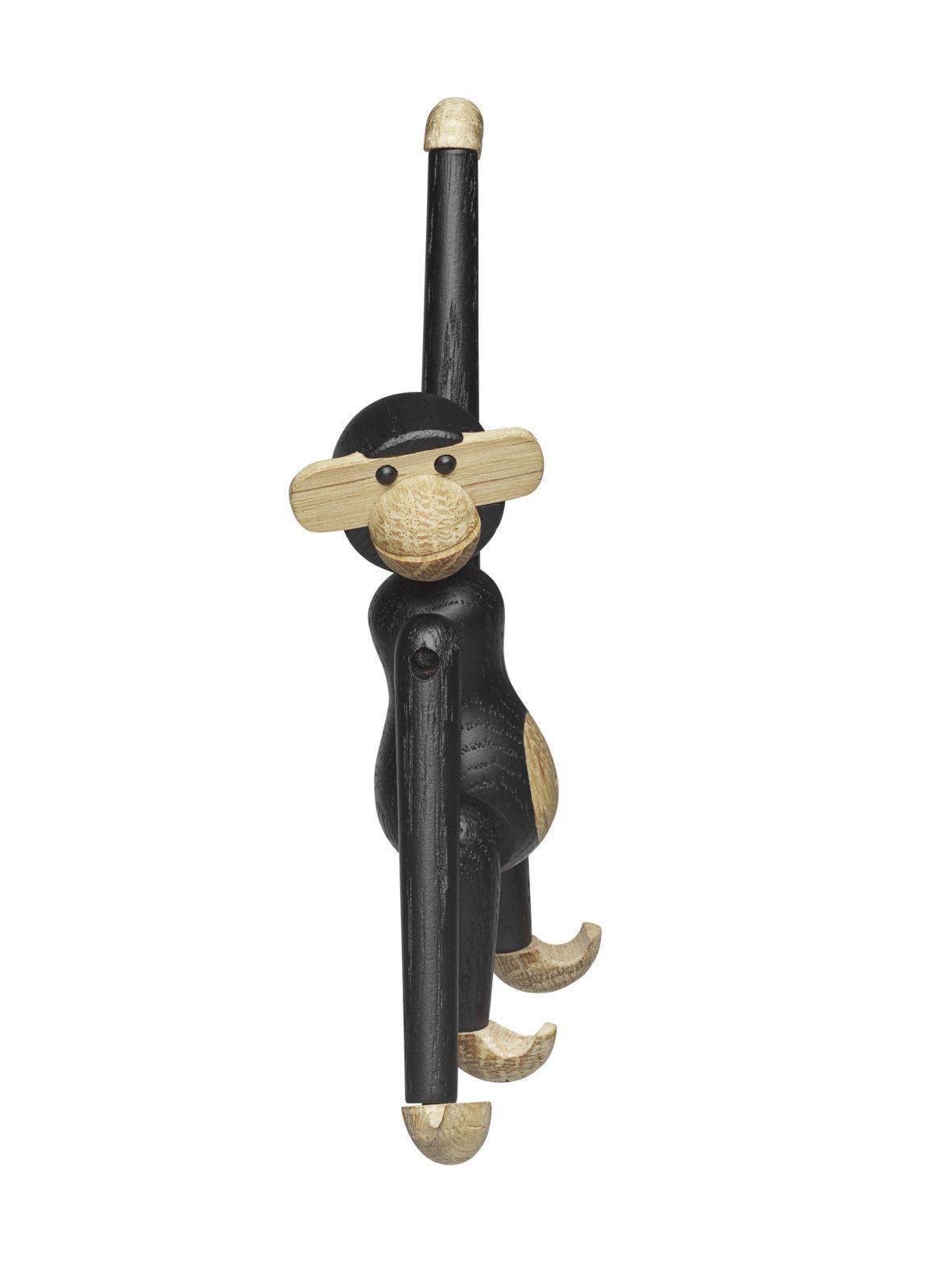 Affe Mini Holzfigur von Kay Bojesen aus dunkler Eiche, hängend dargestellt.