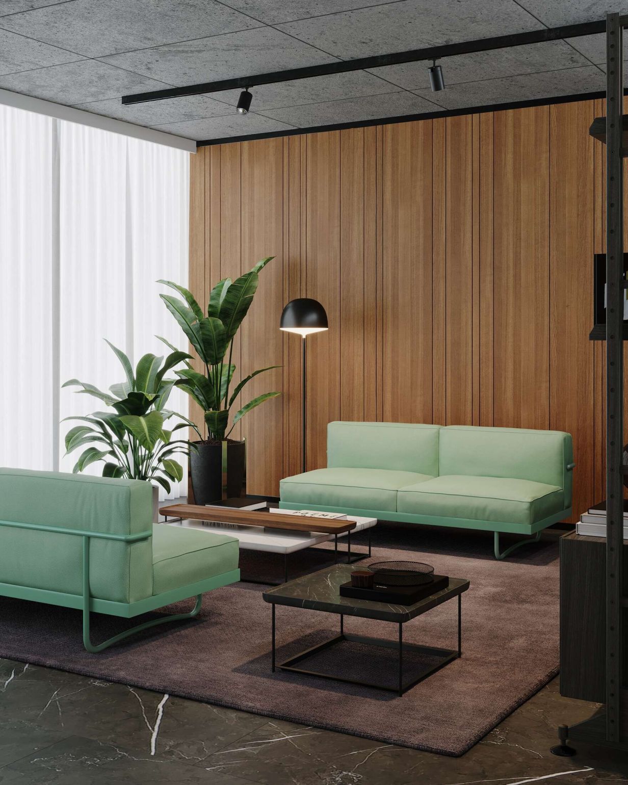 Wohnzimmer mit Cassina 381 Torei Tisch, Couchtisch, Sofa und grünen Akzenten.