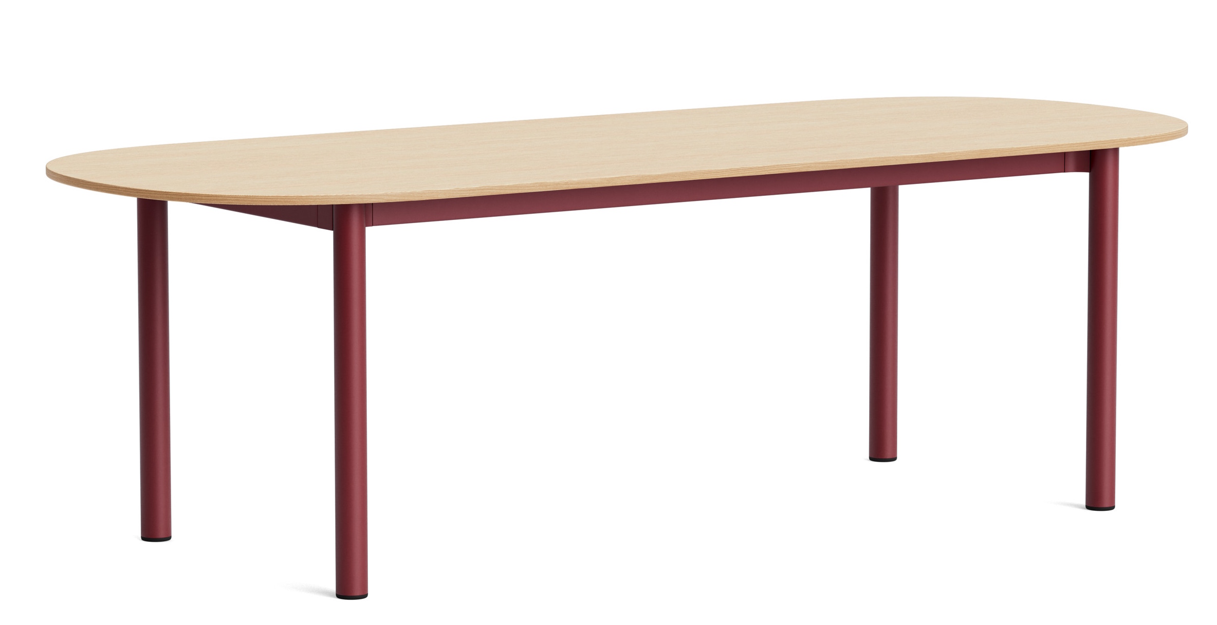 Annex Table von Hay, ein ovaler Esstisch mit heller Holzplatte und weinrotem Metallgestell.