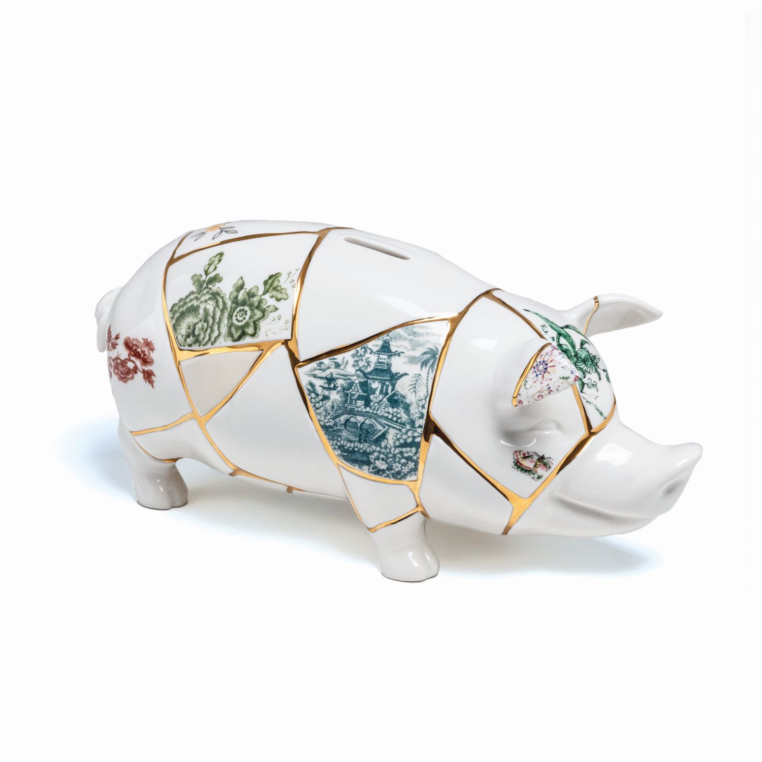 Kintsugi Spardose in Schweinchenform von Seletti, weiße Keramik mit goldenen Fugen und floralen Mustern.
