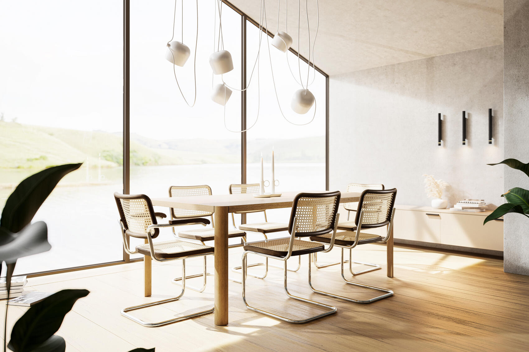 Esszimmer mit Holztisch, sechs Freischwinger Stühlen mit Rattan und moderner Beleuchtung.
