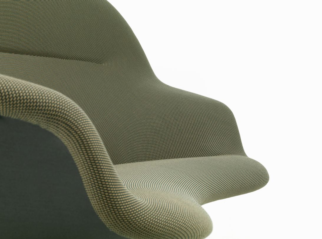 Detailaufnahme des Abalon Sofas von Vitra mit olivgrünem Stoffbezug und abgerundeten Formen.